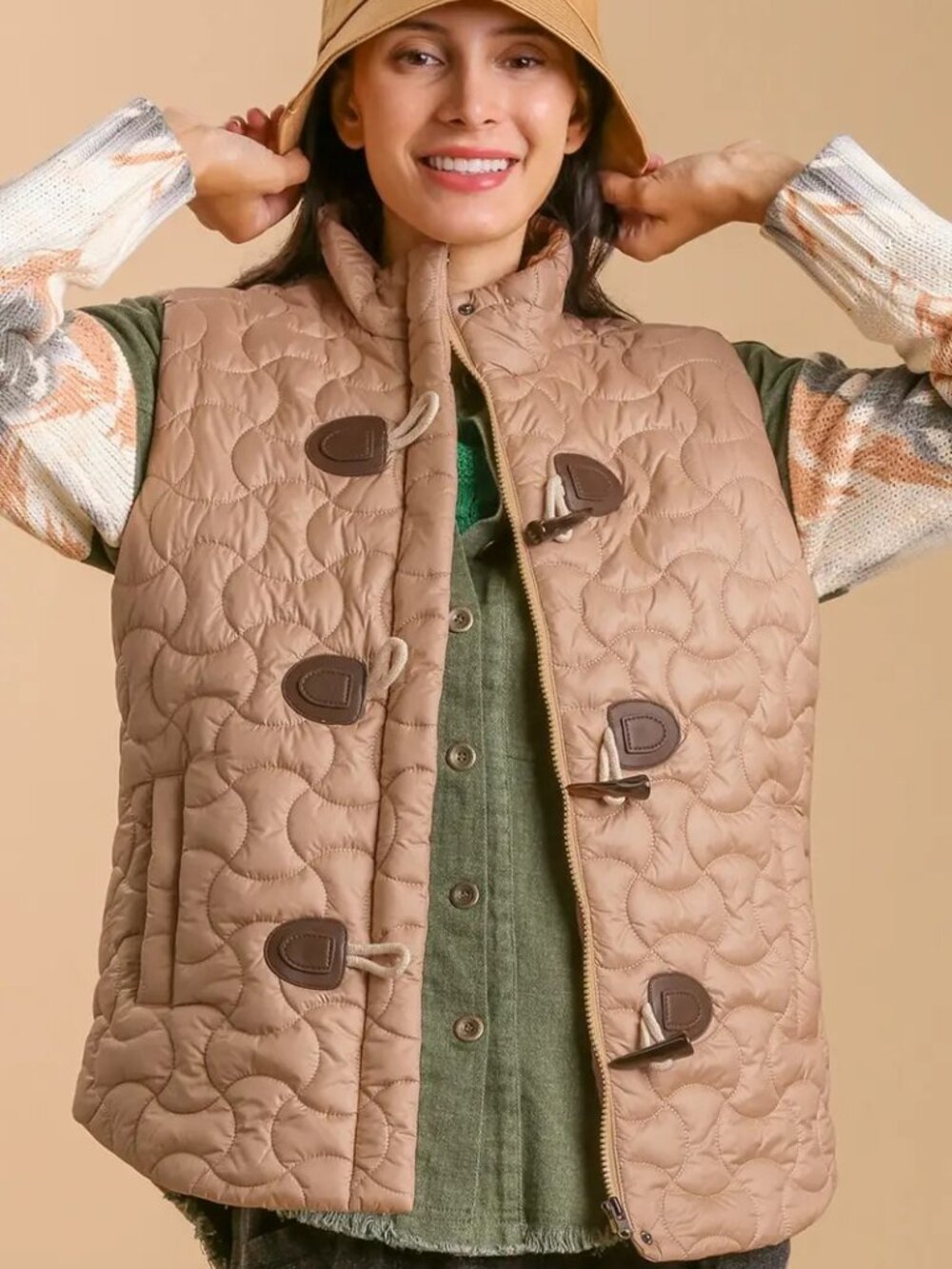 Quilted Zip up vest with toggle button closure and plaid collar